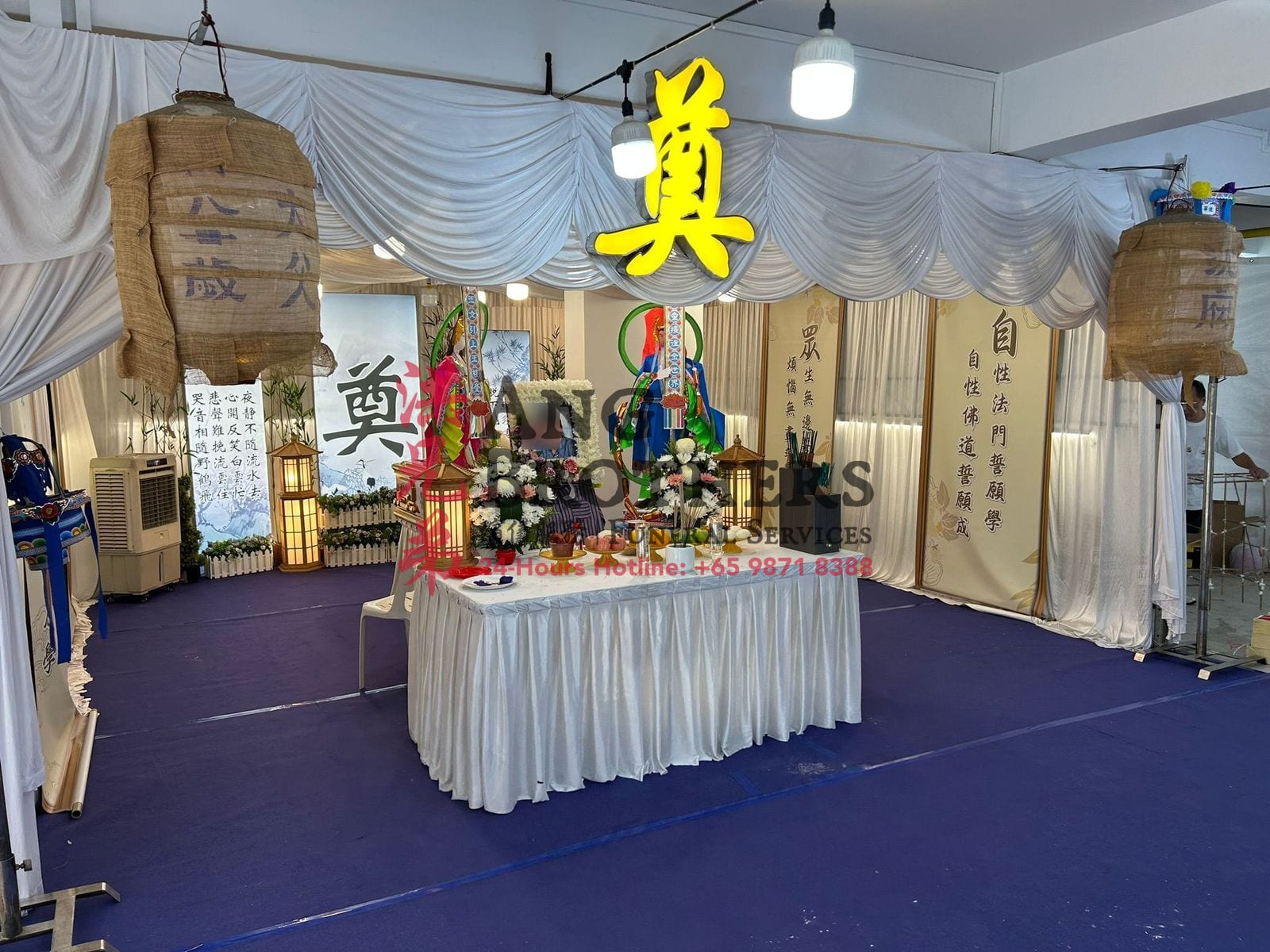 Taoist altar with offerings and deity scrolls